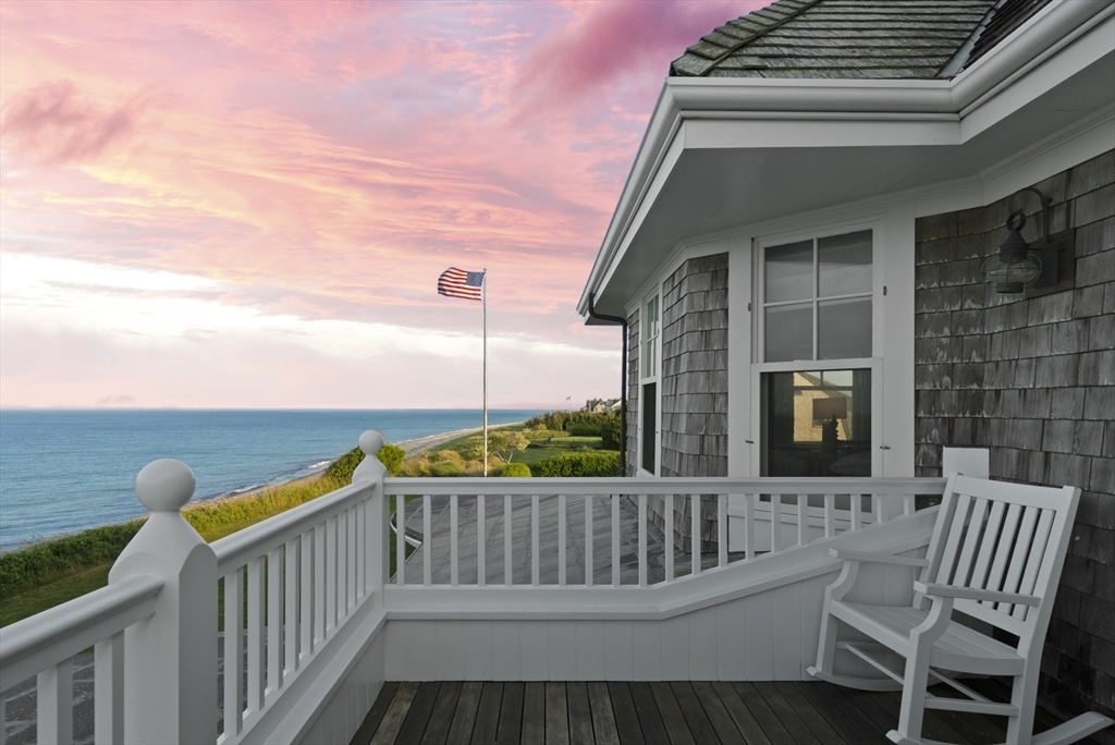 63 Baxter Road Nantucket, MA 02554 - Photo 4 of 21 a view of a chair in the balcony
