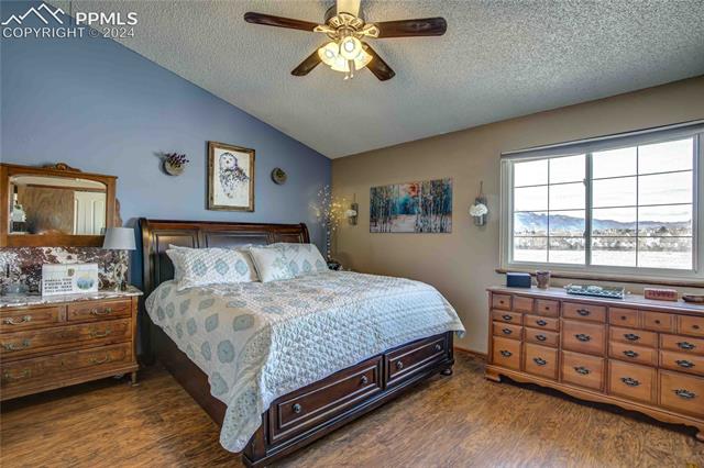 1330 Ride Lane Colorado Springs, CO 80916 - Photo 18 of 48 Primary Bedroom Suite