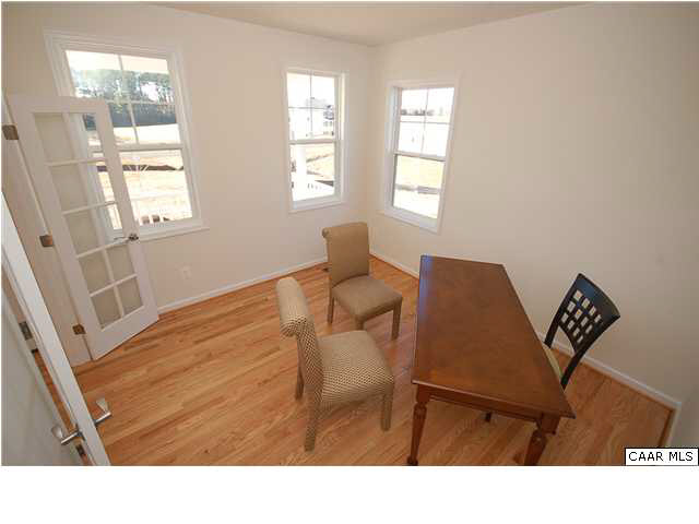 164 Wexford Ridge Road Ruckersville, VA 22968 - Photo 19 of 37 a living room with furniture and a window