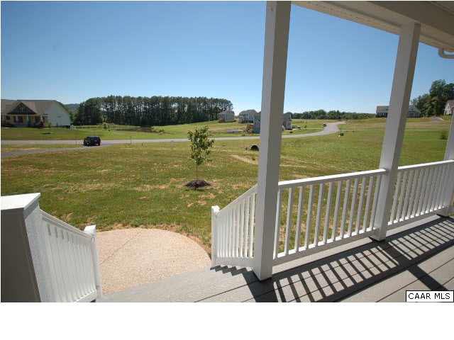 164 Wexford Ridge Road Ruckersville, VA 22968 - Photo 2 of 37 a view of an ocean from a balcony