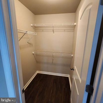 33 Iron Gate Road Sicklerville, NJ 08081 - Photo 14 of 16 a view of walk in closet with wooden floor