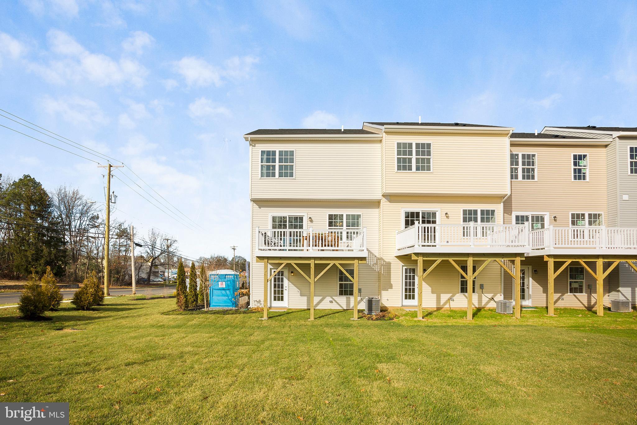 33 Iron Gate Road Sicklerville, NJ 08081 - Photo 16 of 16 a view of an ocean with a building in the background