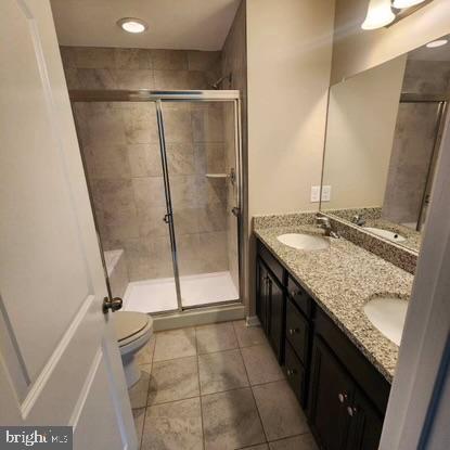 33 Iron Gate Road Sicklerville, NJ 08081 - Photo 10 of 16 a bathroom with a granite countertop sink a toilet and a shower
