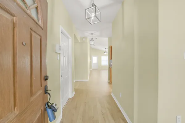 a view of a bathroom from the hallway