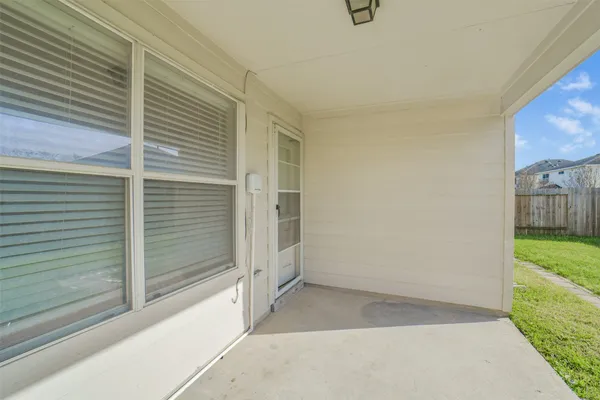 a view of a porch with a door