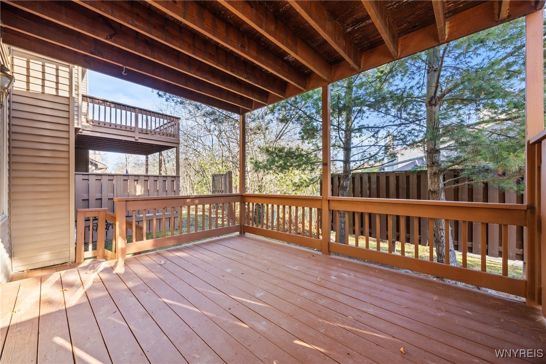 5225 Bridle Path Lane Lewiston, NY 14092 - Photo 37 of 44 large deck off first floor dining area