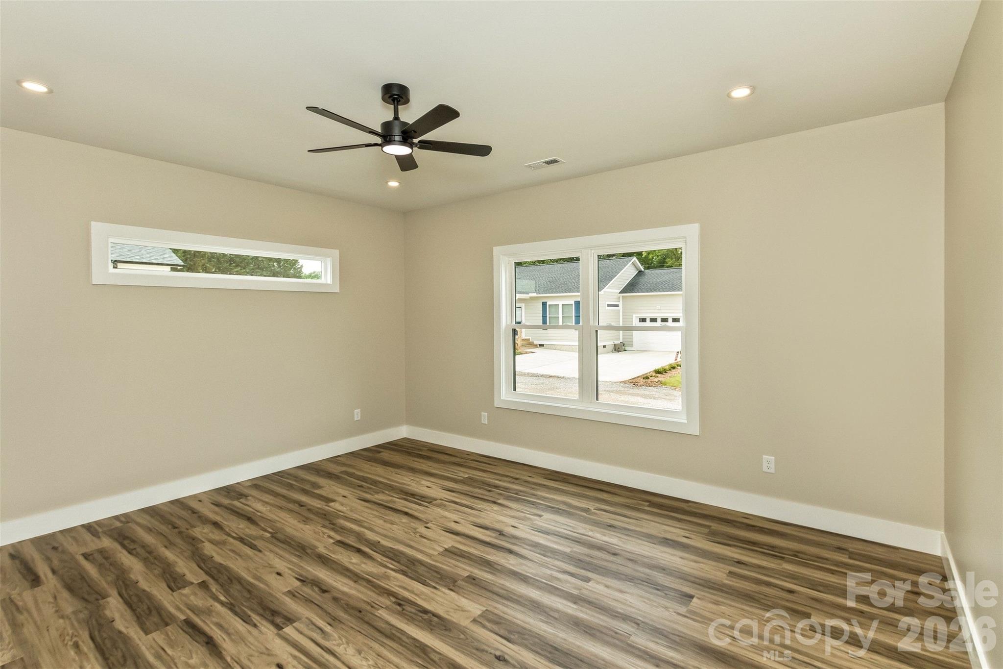 112 Peyton Elaine Road Clyde, NC 28721 - Photo 27 of 35 a view of an empty room with a window