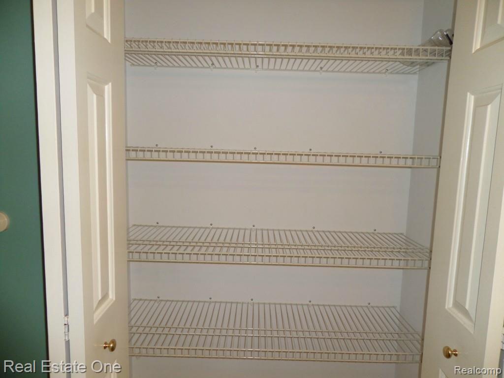 21740 Quail Ridge Drive, Unit 53 Riverview, MI 48193 - Photo 12 of 27 Linen Closet in Bathroom