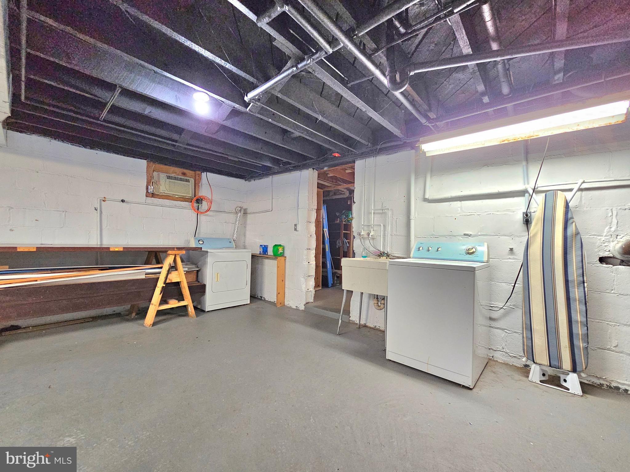 317 Adahi Road Southeast Vienna, VA 22180 - Photo 22 of 24 Basement front room (laundry)