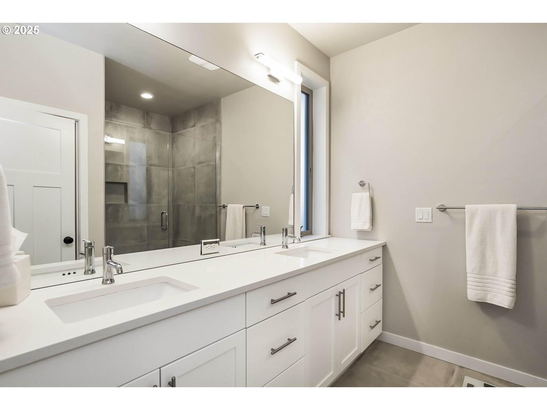 63125 Iner Loop Bend, OR 97701 - Photo 16 of 29 a bathroom with a double vanity sink mirror and double