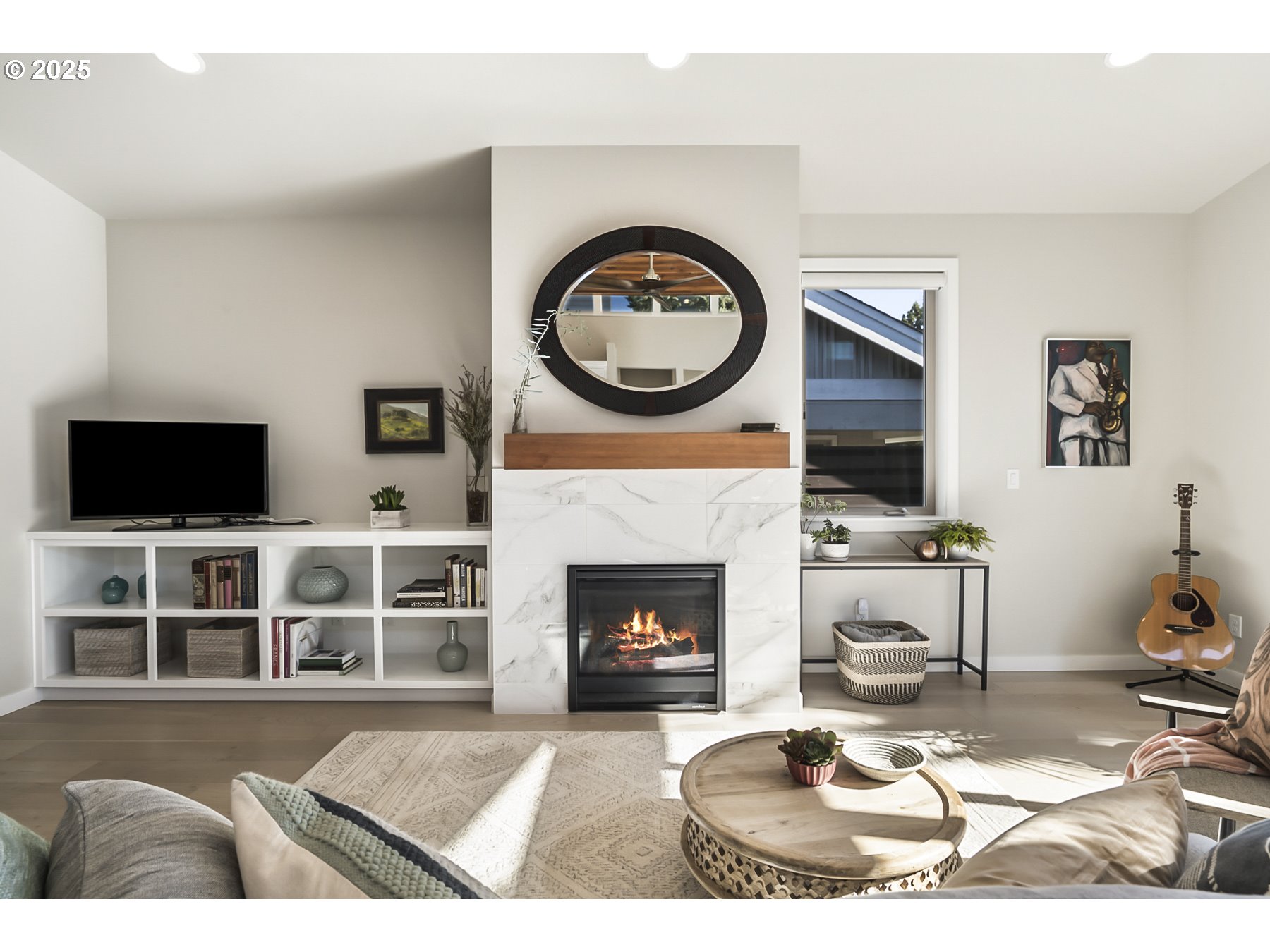 63125 Iner Loop Bend, OR 97701 - Photo 10 of 29 a living room with furniture a rug and a fireplace