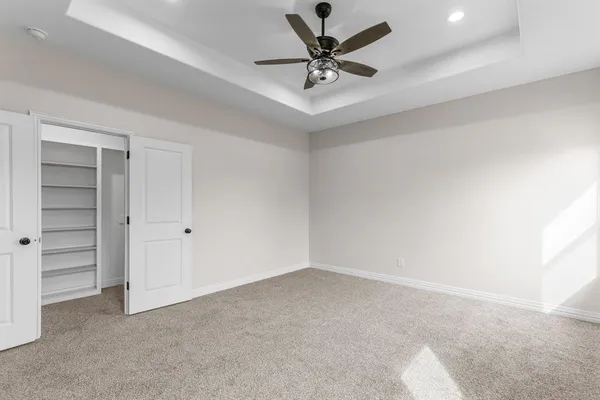 a view of an empty walk in closet