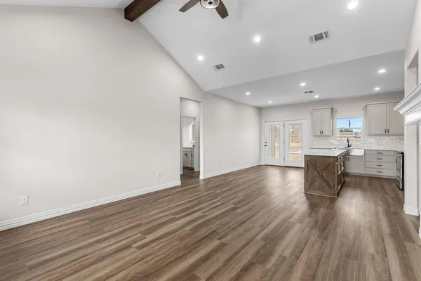 a view of kitchen with wooden floor