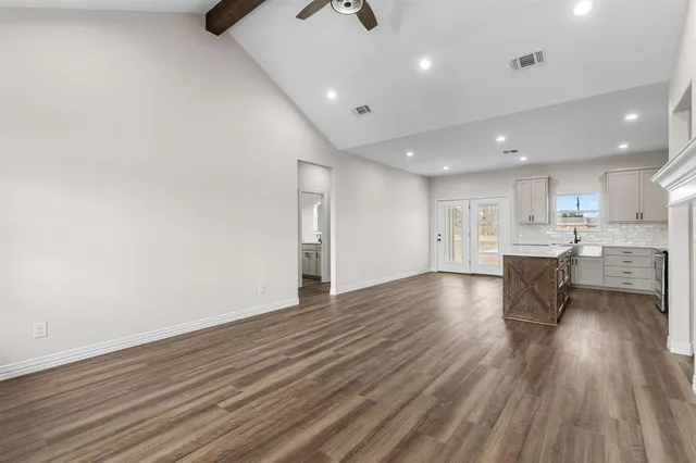 a view of kitchen with wooden floor