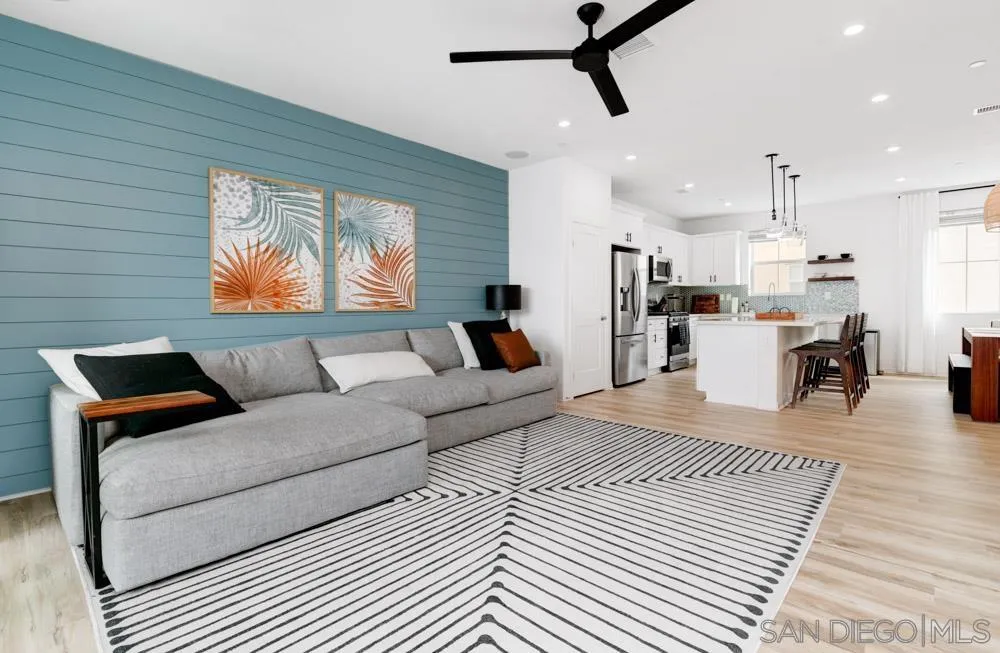 1643 Fig Tree Way Oceanside, CA 92056 - Photo 12 of 29 a living room with furniture and kitchen view