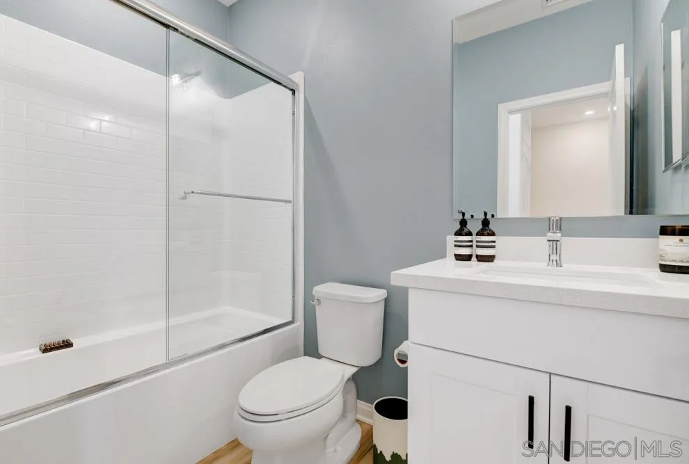1643 Fig Tree Way Oceanside, CA 92056 - Photo 20 of 29 a bathroom with a sink toilet and shower