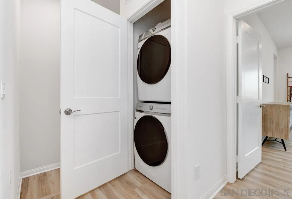 1643 Fig Tree Way Oceanside, CA 92056 - Photo 23 of 29 a close view of a utility room with dryer and washer