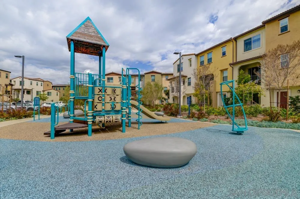 1643 Fig Tree Way Oceanside, CA 92056 - Photo 26 of 29 a cars parked in front of a building