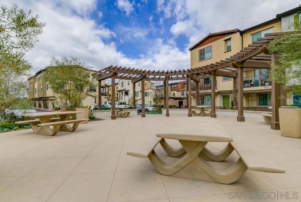 1643 Fig Tree Way Oceanside, CA 92056 - Photo 27 of 29 a view of a swimming pool with outdoor seating