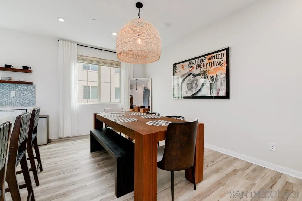 1643 Fig Tree Way Oceanside, CA 92056 - Photo 4 of 29 a view of a dining room with furniture window and wooden floor