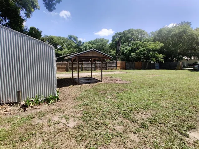 a view of a backyard with a garden