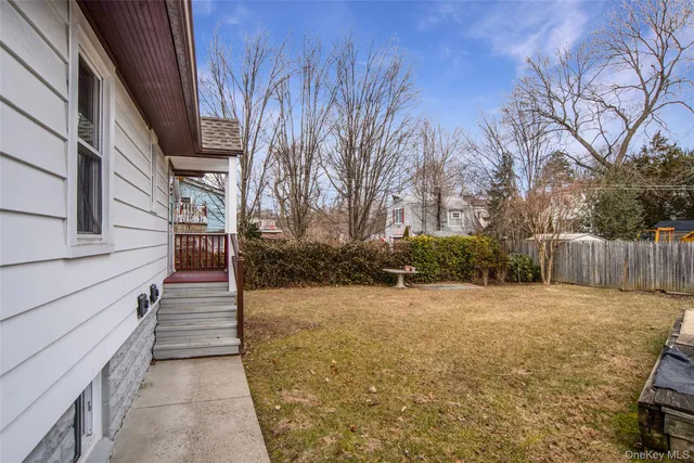 a view of a pathway with a yard