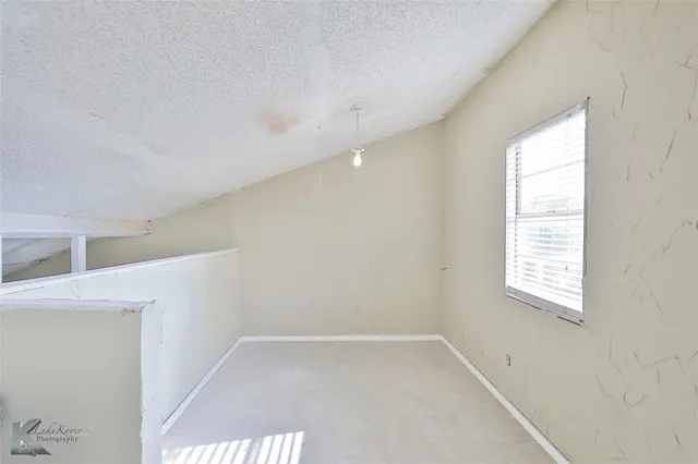 a view of a window in an empty room