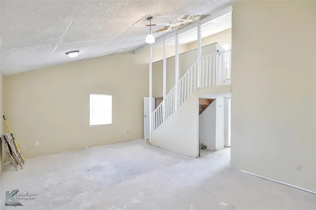 an empty room with windows