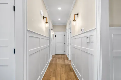 a view of a hallway with white walls