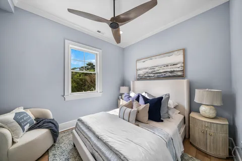 a bedroom with a bed and couch