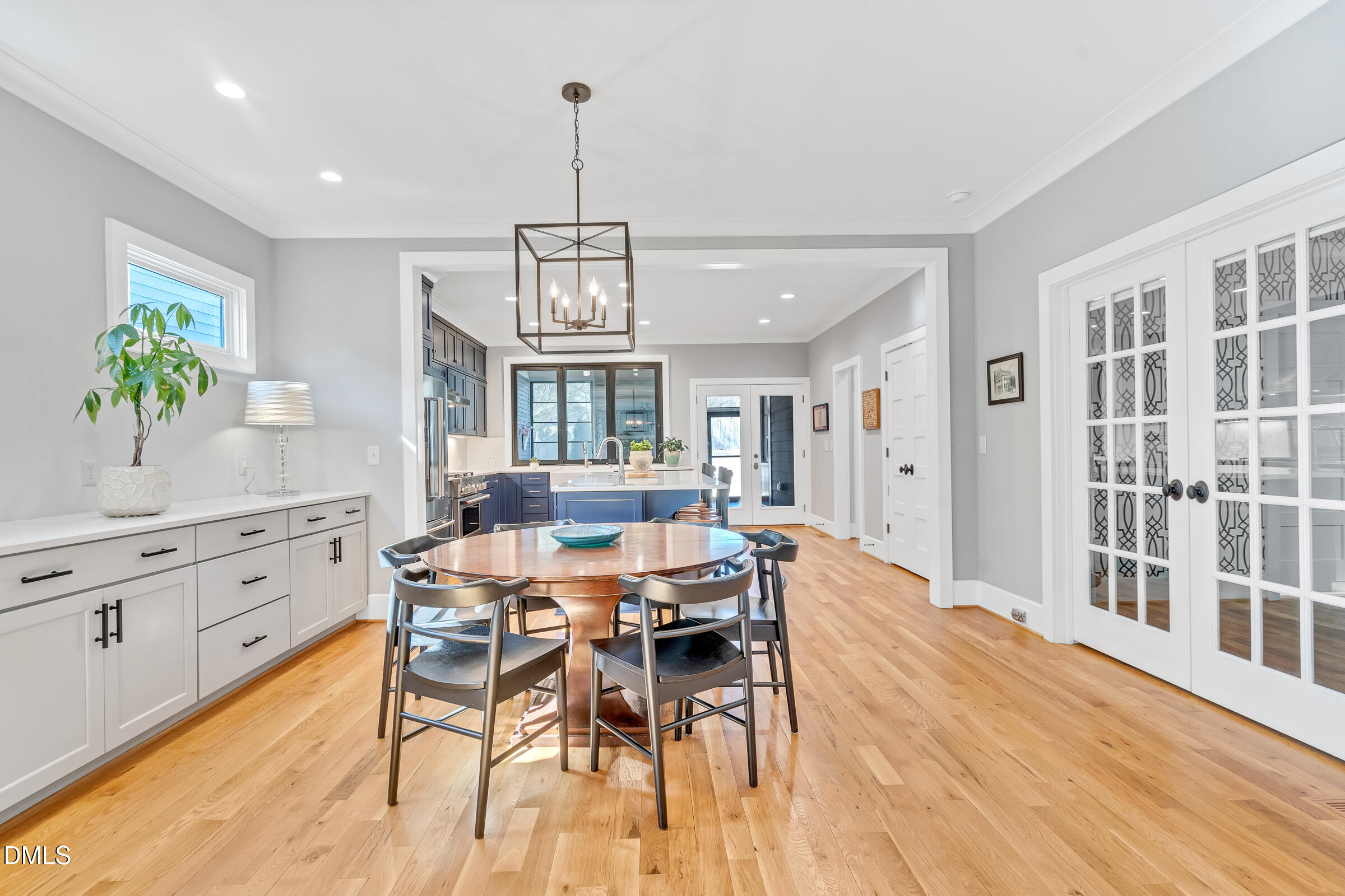 1433 Nottingham Road Raleigh, NC 27607 - Photo 13 of 55 a view of a dining room with furniture window and wooden floor