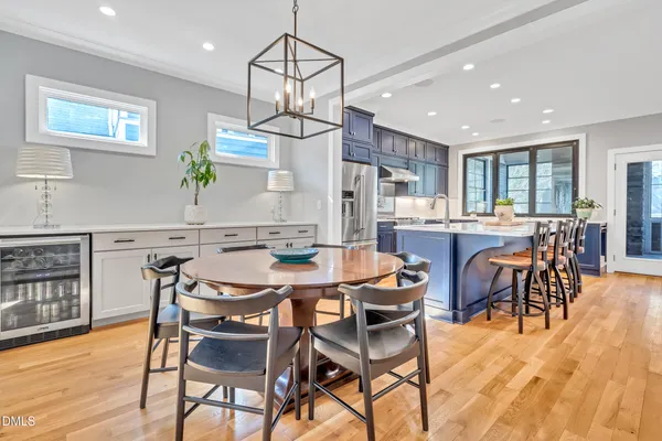 a kitchen with stainless steel appliances granite countertop a sink and cabinets