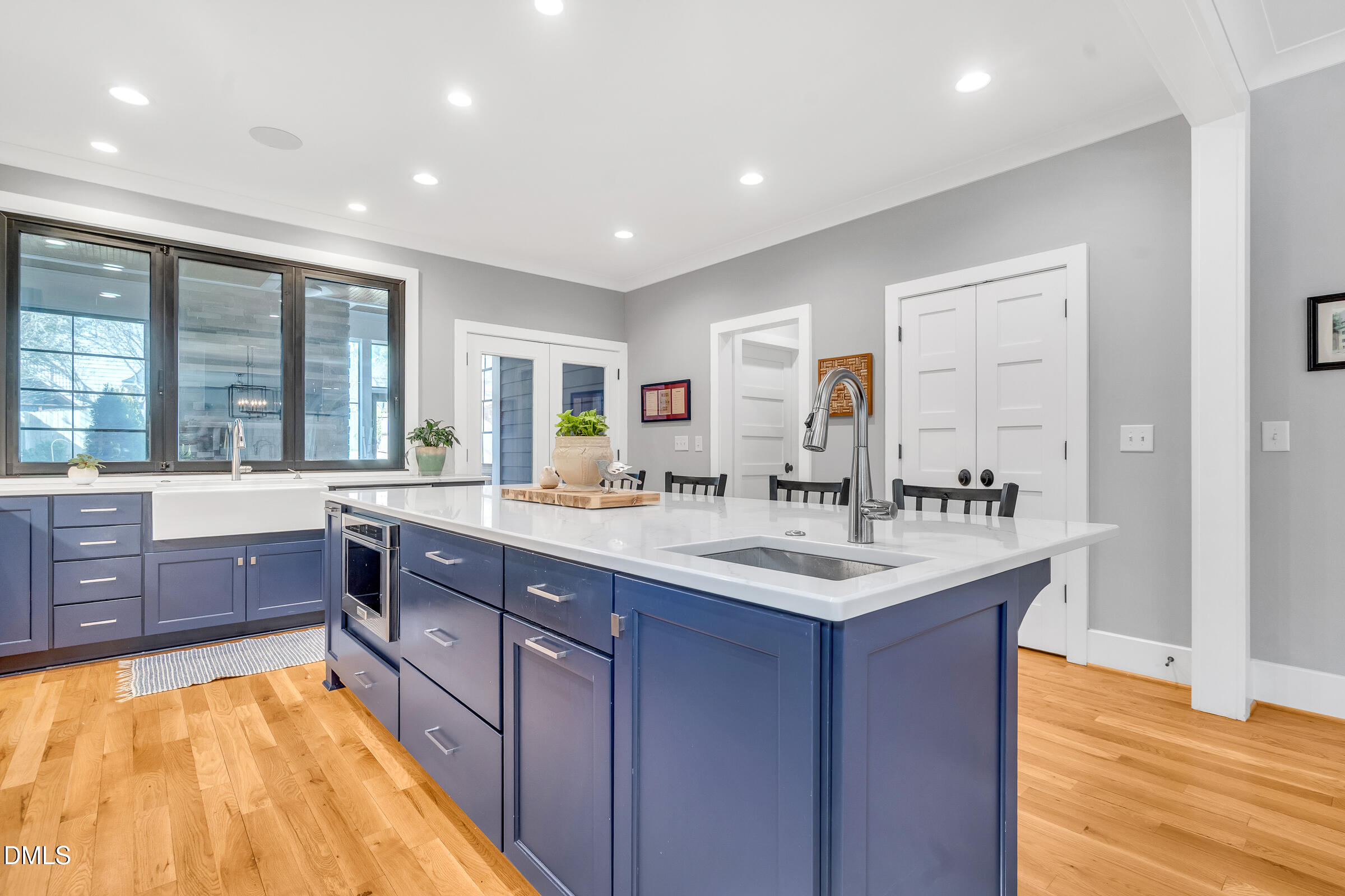 1433 Nottingham Road Raleigh, NC 27607 - Photo 16 of 55 a kitchen with stainless steel appliances granite countertop a sink and cabinets