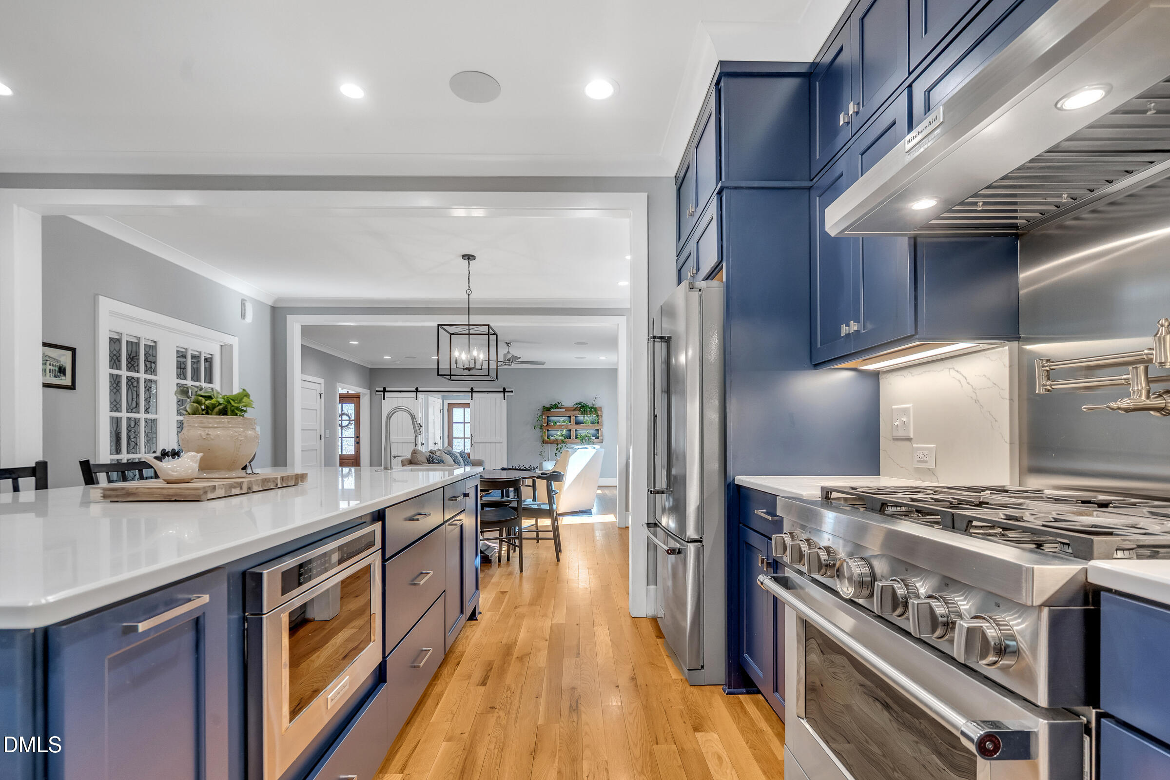 1433 Nottingham Road Raleigh, NC 27607 - Photo 20 of 55 a kitchen with stainless steel appliances granite countertop a stove and a large cabinets
