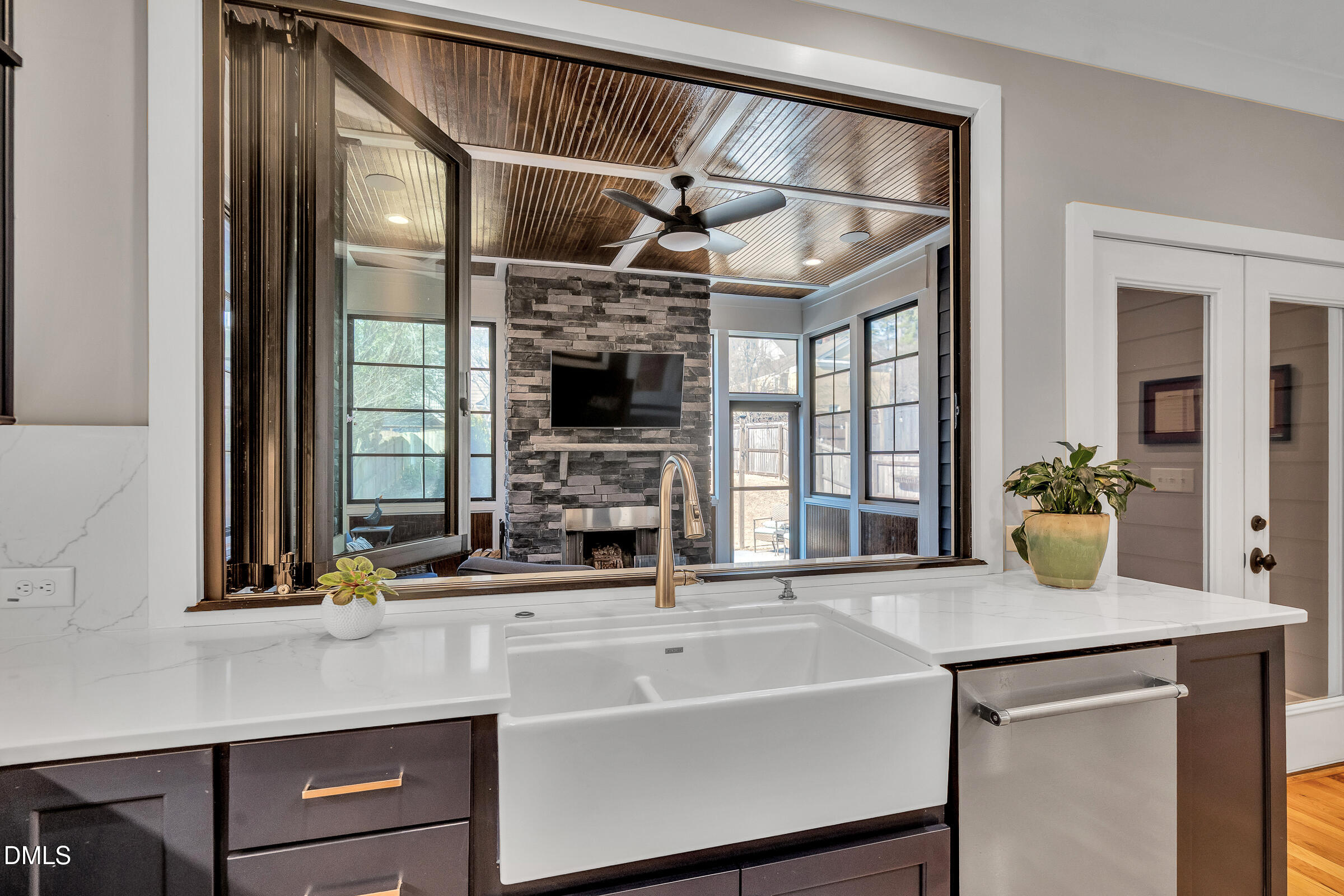 1433 Nottingham Road Raleigh, NC 27607 - Photo 22 of 55 a kitchen with a sink and a refrigerator
