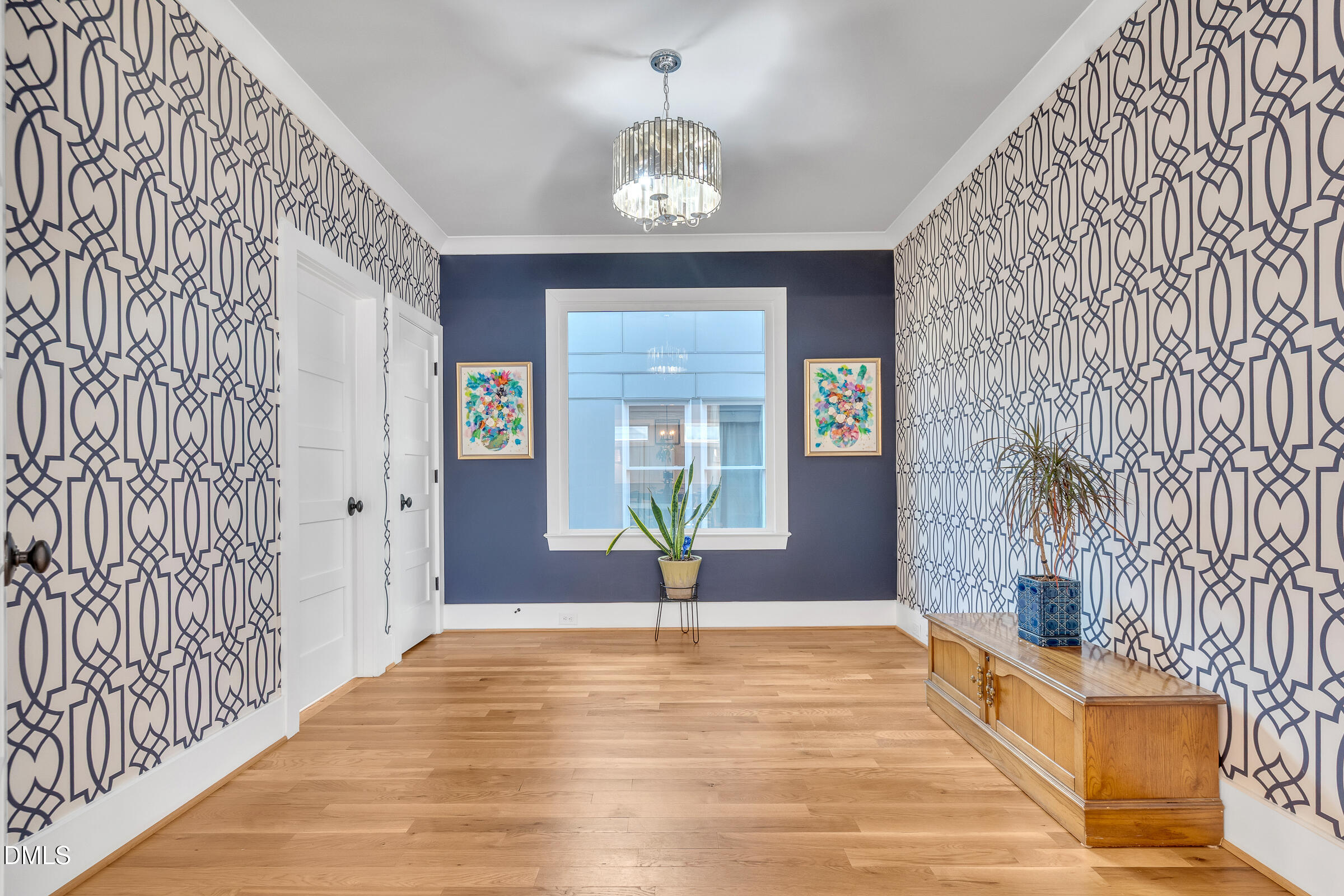 1433 Nottingham Road Raleigh, NC 27607 - Photo 24 of 55 a view of an entryway with a chandelier