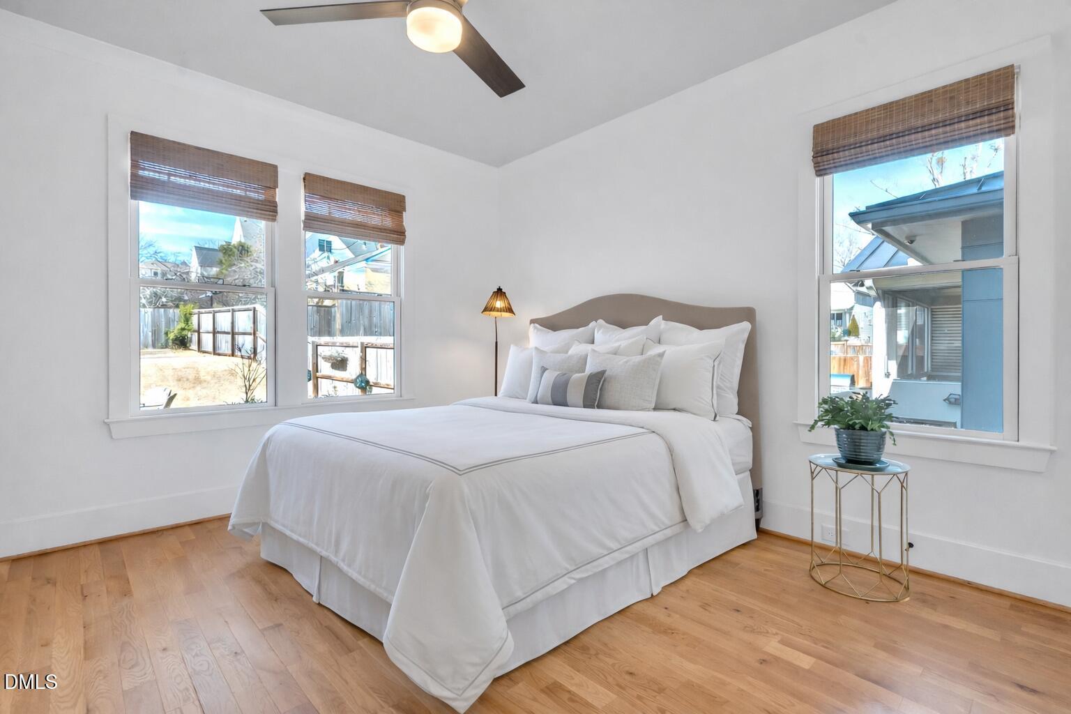 1433 Nottingham Road Raleigh, NC 27607 - Photo 25 of 55 a bedroom with a large bed and a window