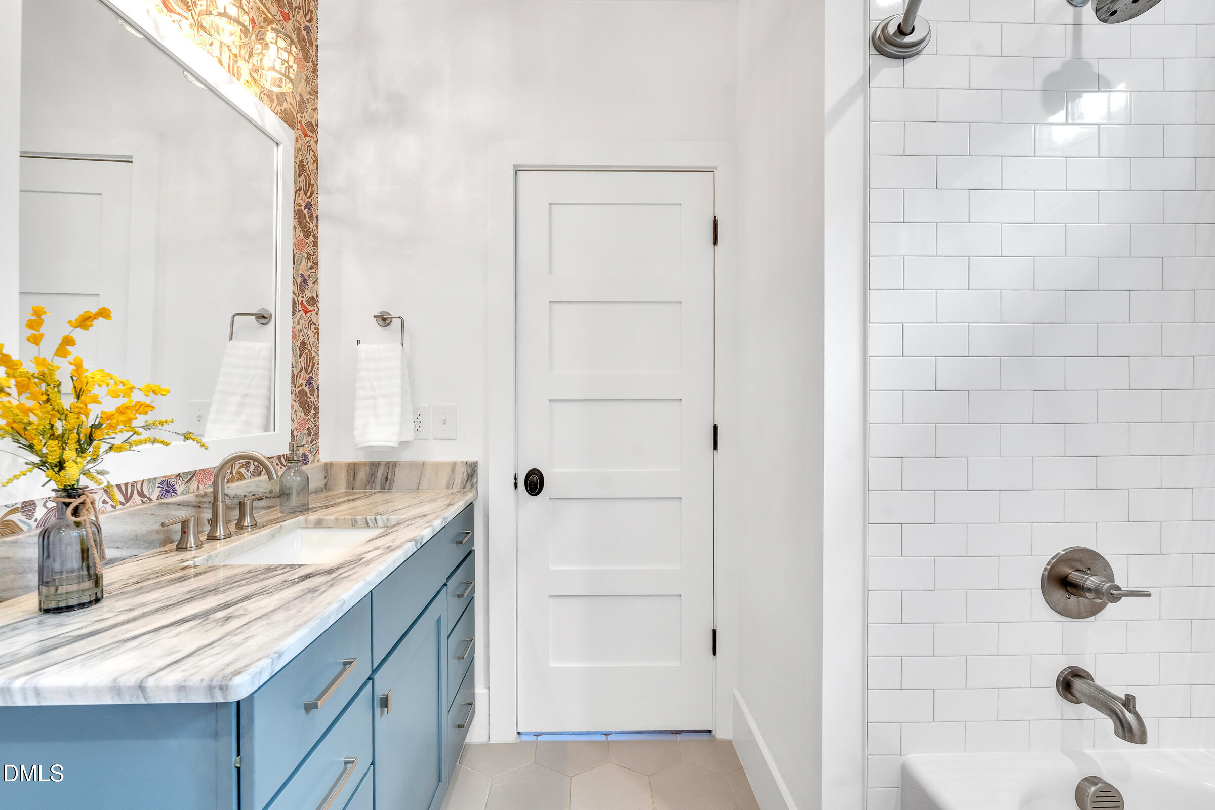 1433 Nottingham Road Raleigh, NC 27607 - Photo 27 of 55 a bathroom with a granite countertop sink a mirror and shower