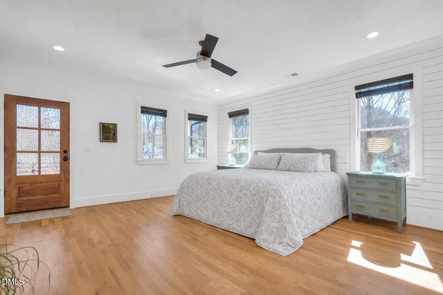 1433 Nottingham Road Raleigh, NC 27607 - Photo 30 of 55 a spacious bedroom with a large bed and a window