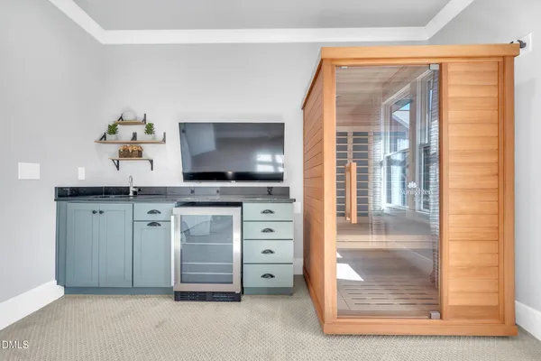 a spacious bedroom with a bed and window