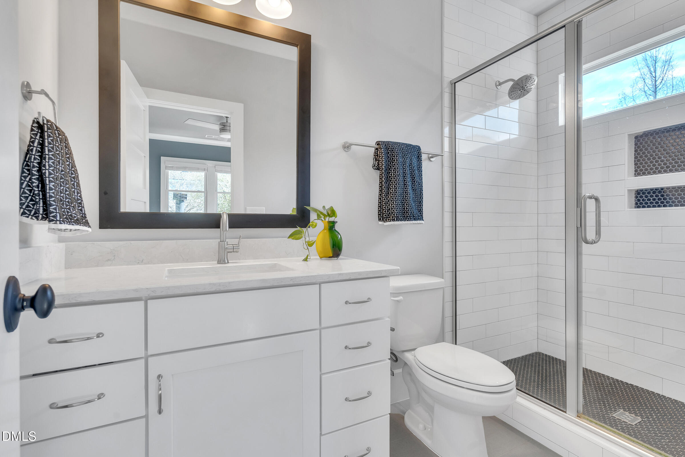 1433 Nottingham Road Raleigh, NC 27607 - Photo 43 of 55 a bathroom with a sink a toilet and shower