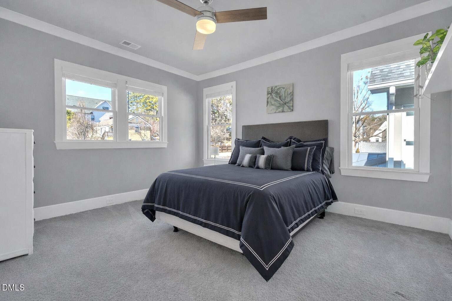 1433 Nottingham Road Raleigh, NC 27607 - Photo 44 of 55 a spacious bedroom with a bed and window