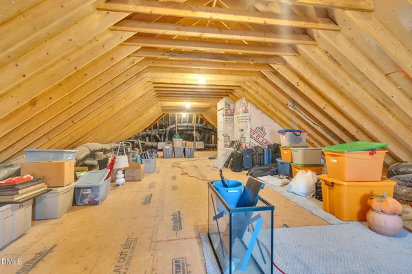 a view of a patio with a table and chairs
