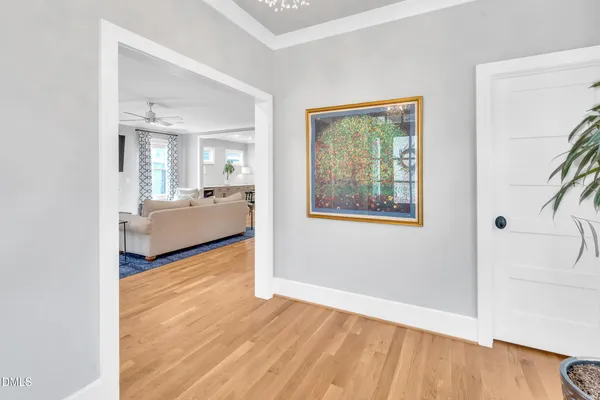 a bathroom with a toilet a sink and a mirror