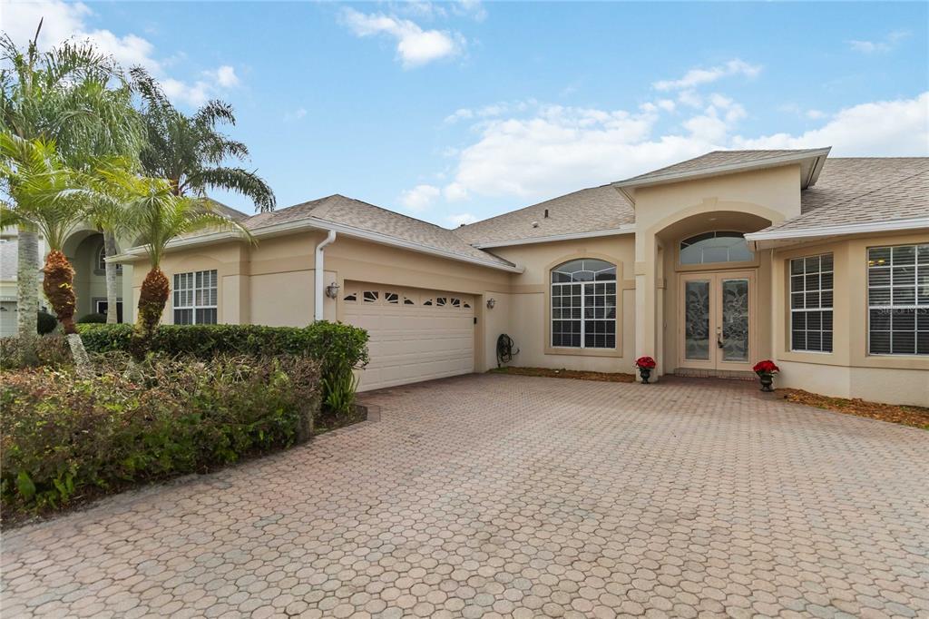 9138 Shadowbrook Trail Orlando, FL 32825 - Photo 2 of 47 front view of a house with a street