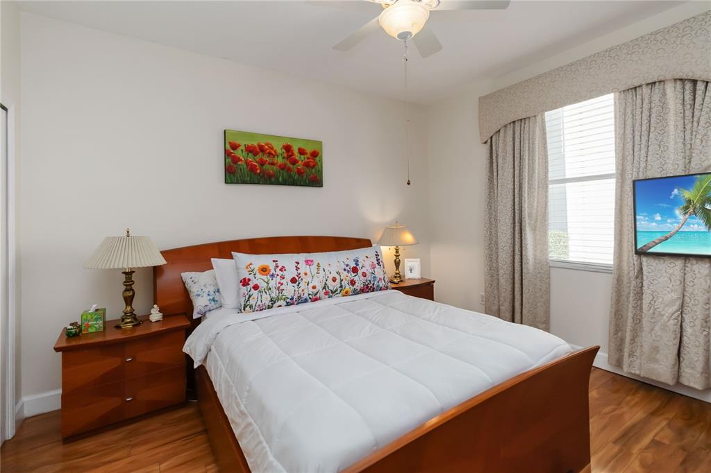 9138 Shadowbrook Trail Orlando, FL 32825 - Photo 21 of 47 a bedroom with a bed and a window