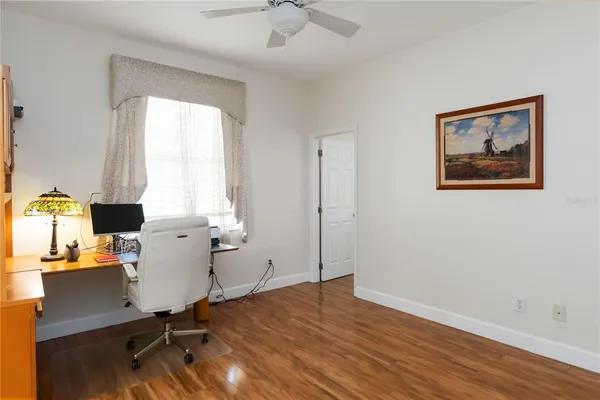 a workspace with furniture and a window