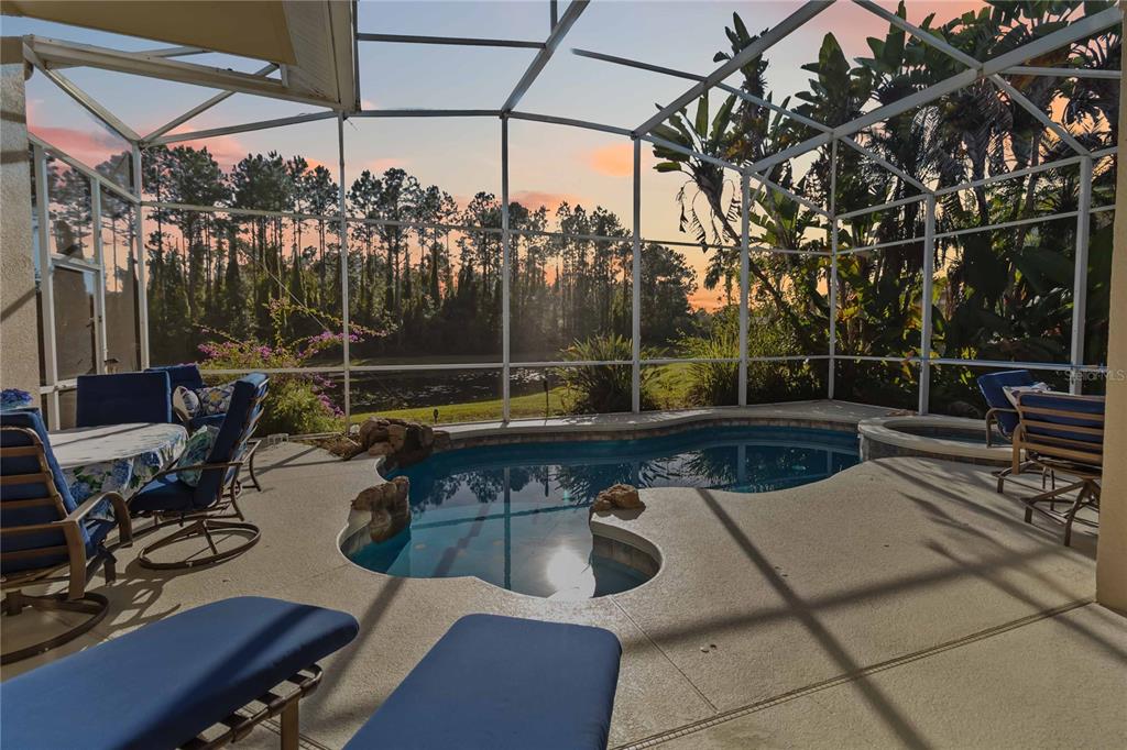 9138 Shadowbrook Trail Orlando, FL 32825 - Photo 29 of 47 a view of a patio with chairs and a table