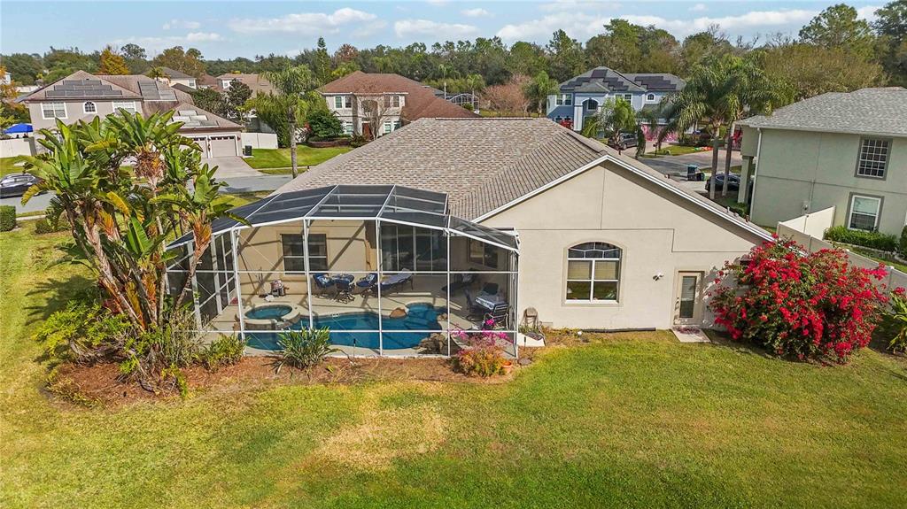9138 Shadowbrook Trail Orlando, FL 32825 - Photo 35 of 47 a view of a house with a yard