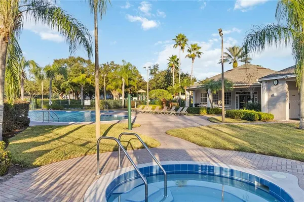 a view of a patio with swimming pool